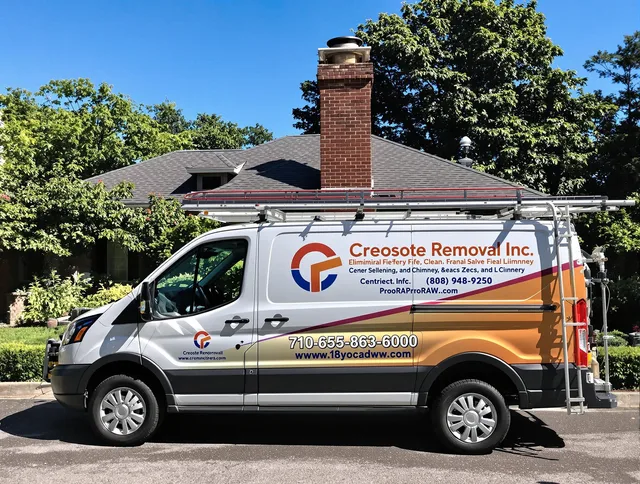 Barrington Chimney Sweep technician removing creosote safely in Barrington, RI